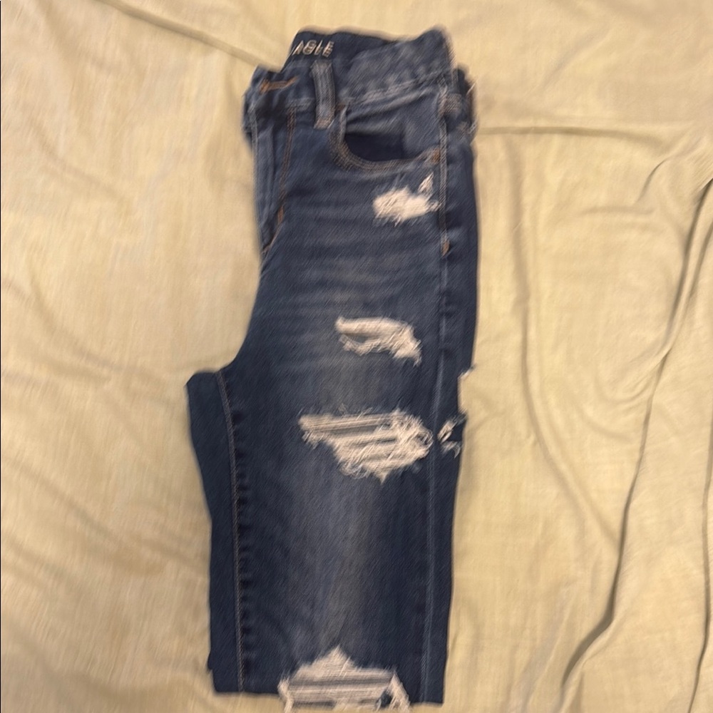 American Eagle Curvy Hi-Rise Jeggings with Modern Distressing size: 0